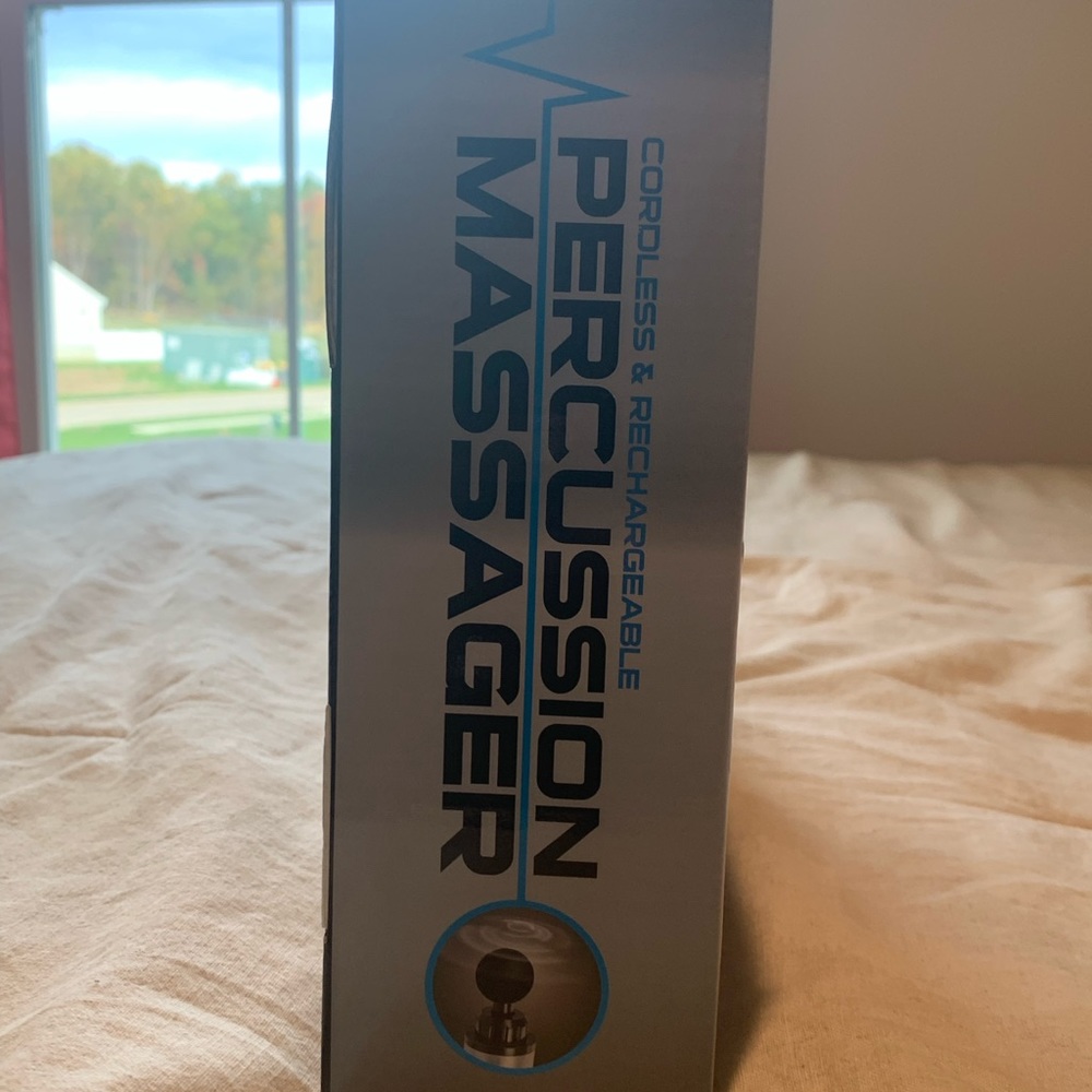 Brand new Cordless & Rechargeable Percussion Massager still in box